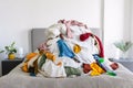 Pile of Unsorted Laundry on a Bed Royalty Free Stock Photo