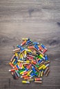 Pile of used AA and AAA batteries for recycling