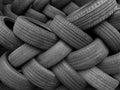 Pile of used car tires, close-up. Black and white Royalty Free Stock Photo