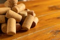 pile of used wine corks on a rustic wooden table Royalty Free Stock Photo