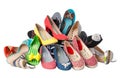 Pile of various female summer shoes, with path