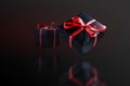 A pile various size black boxed gifts placed on stack. Christmas concept