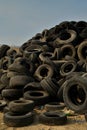 Pile of tires at refuse management dump in Mojave Desert mountains valley town Pahrump, Nevada, USA