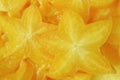 Pile of Orange Yellow Fresh Ripe Star Fruit Slices