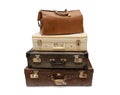 Pile of vintage Suitcases isolated on white background. Old Travel Luggage Royalty Free Stock Photo