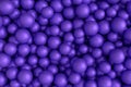 Pile of violet fitness ball or fitball falling on white background