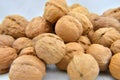 A pile of walnuts on the white background Royalty Free Stock Photo