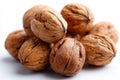 A pile of walnuts on a white surface Royalty Free Stock Photo