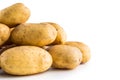 A pile washed potatoes isolated on white.