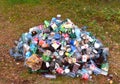 Pile of waste plastic bottles, aluminium can from drinking and paper coffee cup. Plastic bottles garbage waste for recycle. Waste