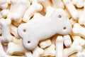 Pile of white color dog biscuits in the shape of a bone Royalty Free Stock Photo