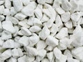 Pile of white naturale cracked stones used to decorate the garden or parts of the house indoor or outdoor