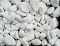 Pile of white naturale stones used to decorate the garden or parts of the house