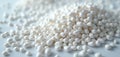 Pile of white plastic resin pellets. PVC, polyethylene thermoplastic compound, polymer, polystyrene, extrusion raw material for Royalty Free Stock Photo