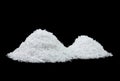 Pile of white snow isolated on black background. Close up image of white snow. Snowflakes on a black background Royalty Free Stock Photo