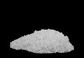 A pile of white snow isolated on a black background Royalty Free Stock Photo