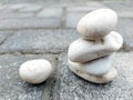 a pile of white stones as a symbol of cohesiveness and a philosophy of serenity