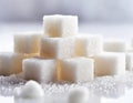 A pile of white sugar cubes on a white background Royalty Free Stock Photo