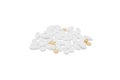 Pile of White and yellow pills isolated on white background. Royalty Free Stock Photo