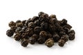 A pile of whole black pepper.