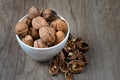 Dry whole  and  cracked walnuts Royalty Free Stock Photo