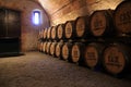 Pile of wine barrels in a wine cellar