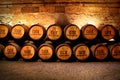 Pile of wine barrels in a wine cellar