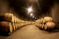 Pile of wine barrels in a wine cellar