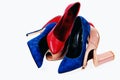 Pile of womens shoes in various colours