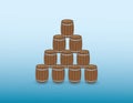Pile of wooden barrels to store and transport things on blue background vector illustration Royalty Free Stock Photo