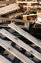 Pile of wooden pallets piled in a landfill Royalty Free Stock Photo