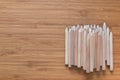 Pile of wooden pencils lying on the desk. Background for office themes.