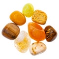 Pile of yellow and brown natural mineral gemstones