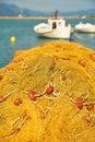 Pile of yellow fishing nets in port Royalty Free Stock Photo