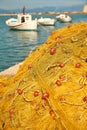 Pile of yellow fishing nets in port Royalty Free Stock Photo