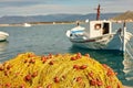 Pile of yellow fishing nets in port Royalty Free Stock Photo