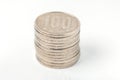 Pile of 100 yen coins japanese money on white background. Royalty Free Stock Photo