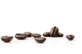piled of coffee beans group roast dark brown textured with macro view isolated on white backgrounds