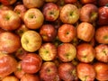 piles of apples on supermarket