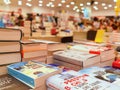 Piles of books on sale at modern bookshop Royalty Free Stock Photo