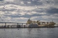 Piles of boxes, bridge and Dole Pacific container ship, San Diego, CA, USA