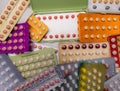 Piles of colorful birth control pills Royalty Free Stock Photo