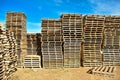 piles of european pallets made in wood ready to be used transporting products or goods on them from a place to other by truck, Royalty Free Stock Photo