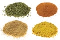 Piles of different spices Isolated On White