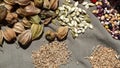 Piles of dried beans and grain and fresh fruit Royalty Free Stock Photo