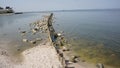 Piles from the former airfield leave the line to the Taganrog Bay of the Sea of Azov from the coast in the city of Yeisk