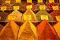 Piles of fresh bright colorful local turkish spice ingredient in Istanbul spice market including curry, paprika, masala, mint