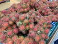 Piles of Fruits Called Rambutan, On Blue Square Basket