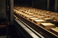 Piles gold bar conveyor photo closeup. Generate Ai