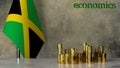 Piles of gold coins on a marble table against the background of the flag of Jamaica.
